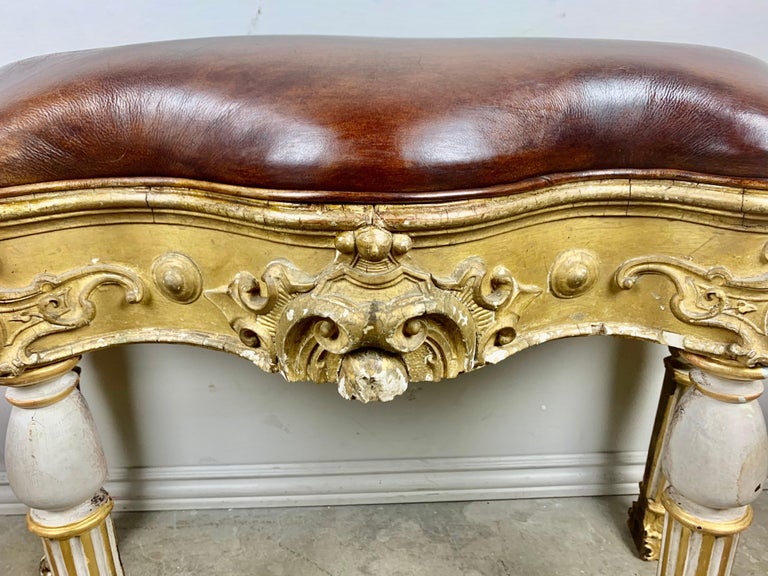 Italian Painted and Parcel Gilt Leather Bench