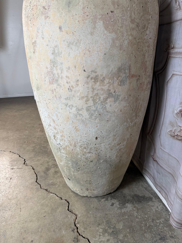 Pair of Monumental Terracotta Olive Jars with Weathered Patina