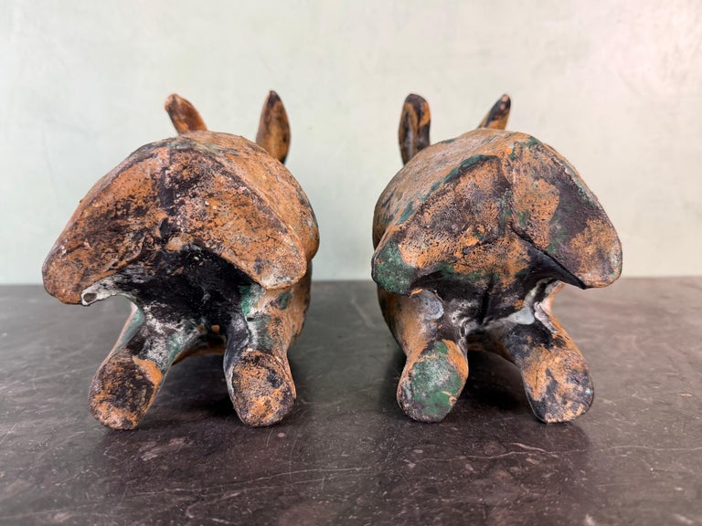 Pair of Weathered Cast Iron Rabbit Garden Sculptures with Verdigris Patina