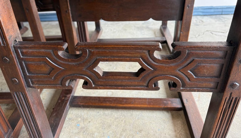 Set of Ten Spanish Revival Leather Dining Chairs, circa 1920s