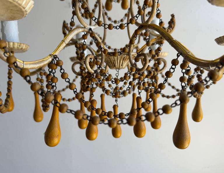 Pair of Italian Gilt Iron and Wood Beaded Chandeliers, Mid-20th Century