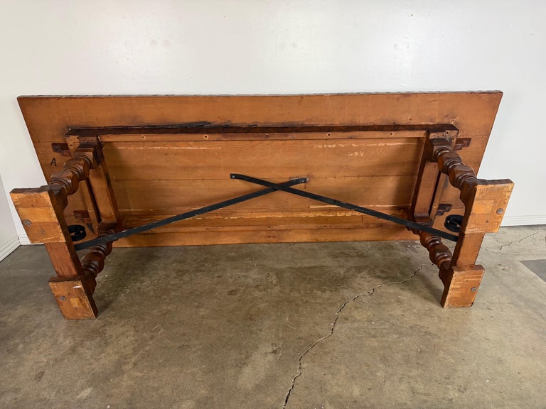 Monumental Spanish Revival Style Walnut Trestle Dining Table with Hand-Hewn Top
