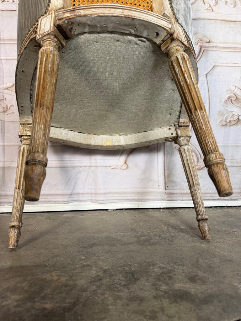Antique French Louis XVI Style Painted Bergère Chair with Cane Back
