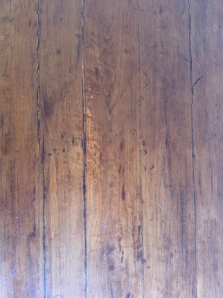 Spanish Colonial Revival Walnut Dining Table with Hand-Carved Scrollo