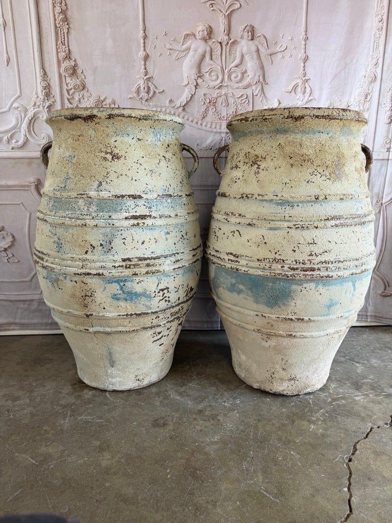 Pair of Large Distressed Mediterranean Style Terracotta Olive Jars with Handles
