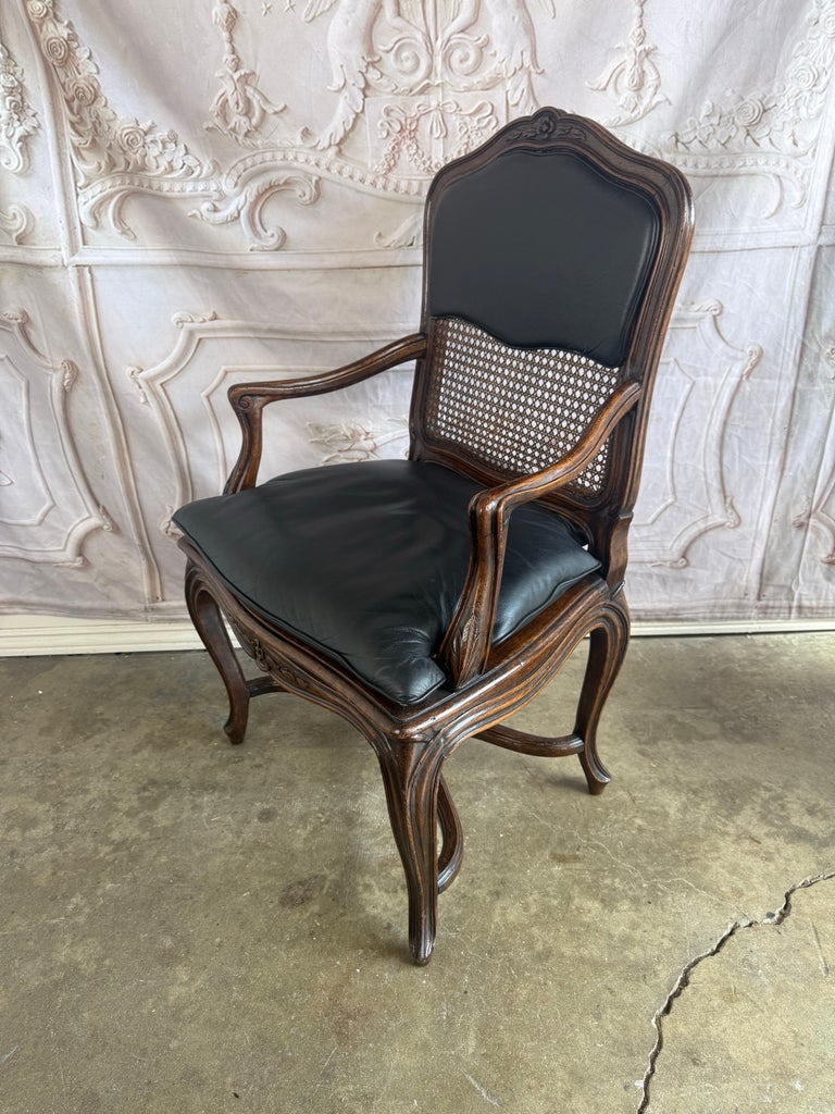 Eight French Provincial-style dining chairs