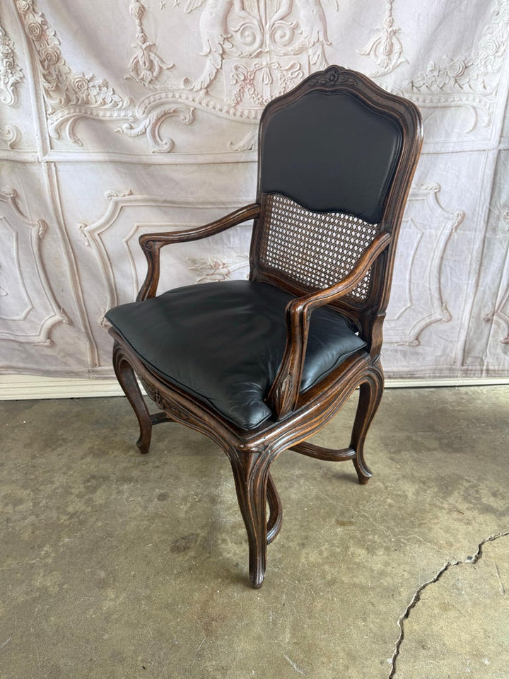 Eight French Provincial-style dining chairs