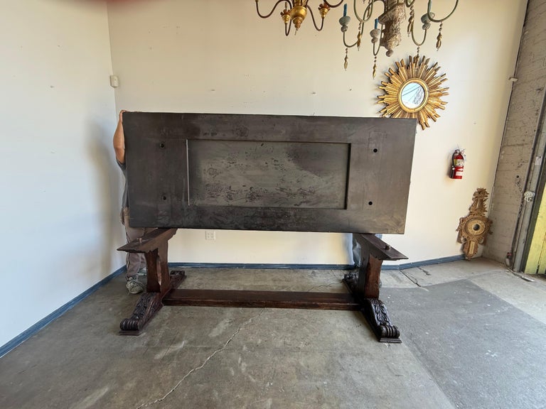 Monumental Spanish Revival Carved Trestle Dining Table, Early 20th Century