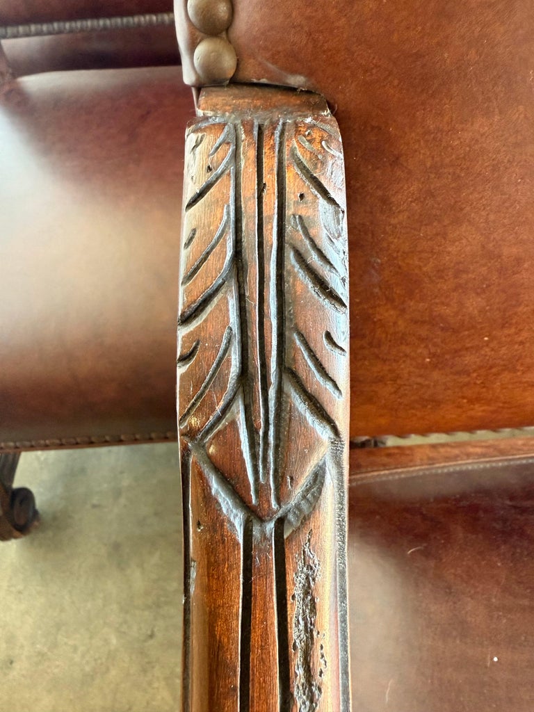 Set of Eight Spanish Revival Leather and Carved Walnut Dining Chairs