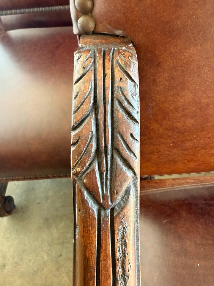 Set of Eight Spanish Revival Leather and Carved Walnut Dining Chairs
