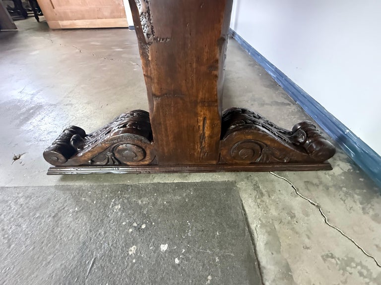 Monumental Spanish Revival Carved Trestle Dining Table, Early 20th Century