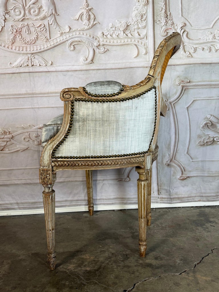 Antique French Louis XVI Style Painted Bergère Chair with Cane Back