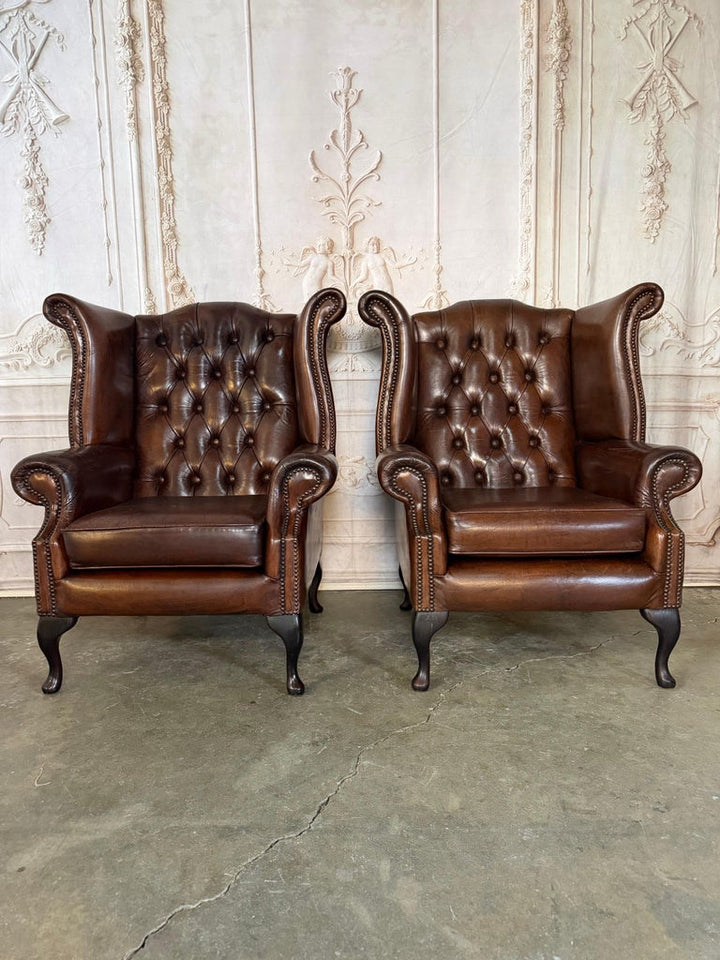 Pair of Vintage English Tufted Leather Wingback Armchairs