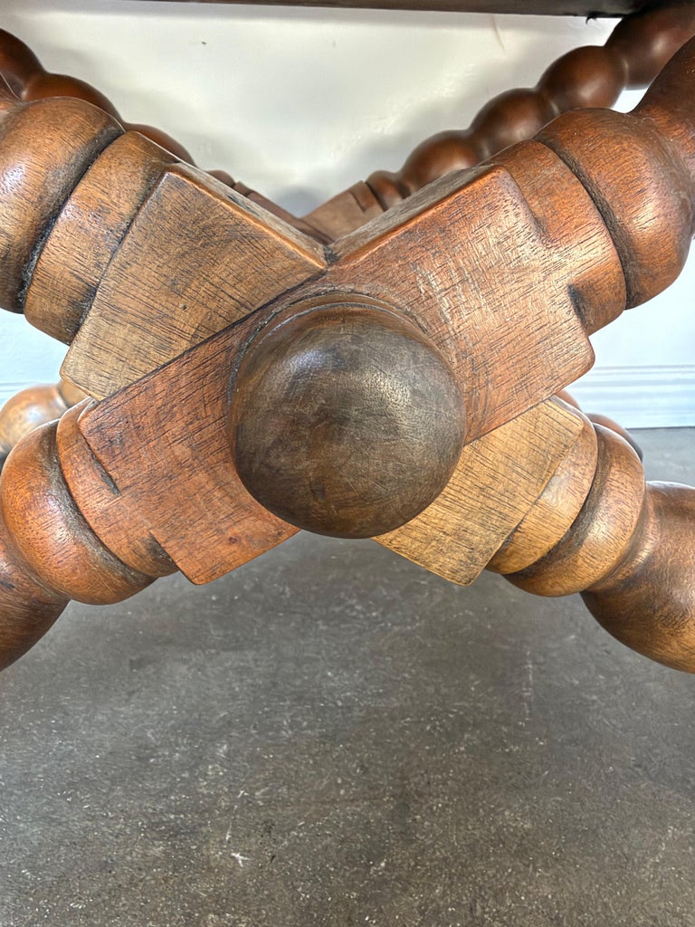 Pair of Spanish Colonial Baroque Bobbin - X-Base Stools with Distressed Leather