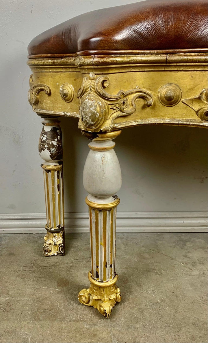 Italian Painted and Parcel Gilt Leather Bench