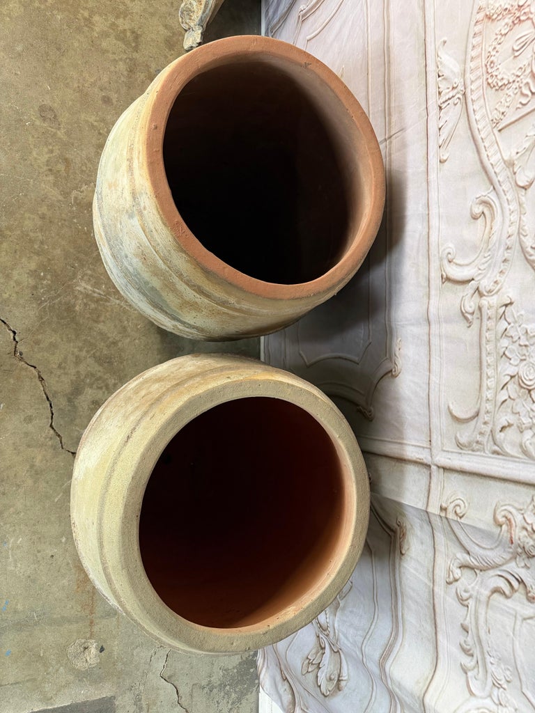 Pair of Antique Mediterranean Terracotta Storage Jars with Weathered Patina