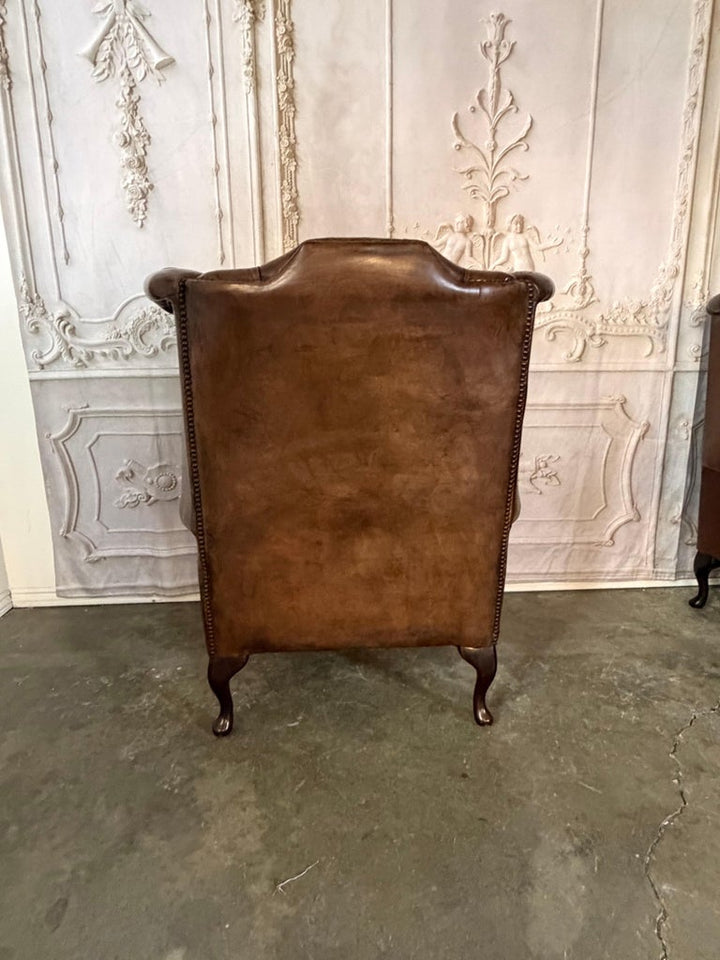 Pair of Vintage English Tufted Leather Wingback Armchairs