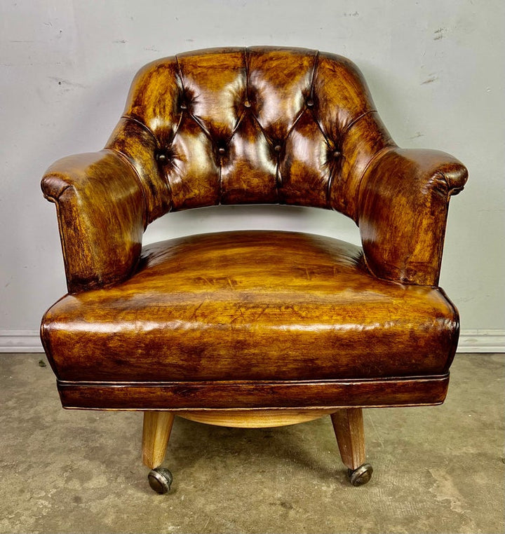 Pair of Mid-Century Leather Tufted Armchairs on Swivels