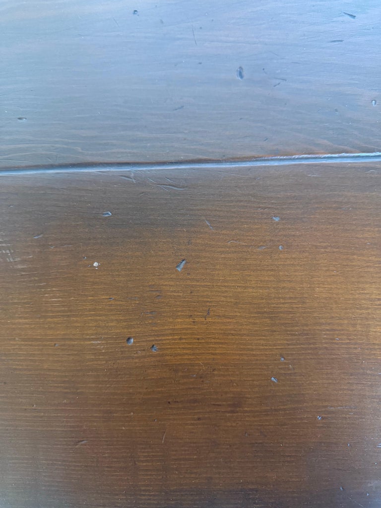 Monumental Spanish Revival Style Walnut Trestle Dining Table with Hand-Hewn Top