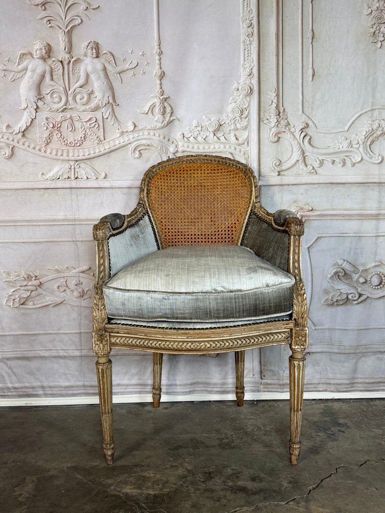 Antique French Louis XVI Style Painted Bergère Chair with Cane Back