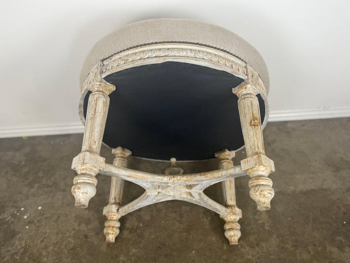 French Neoclassical upholstered ottoman, early 20th century.