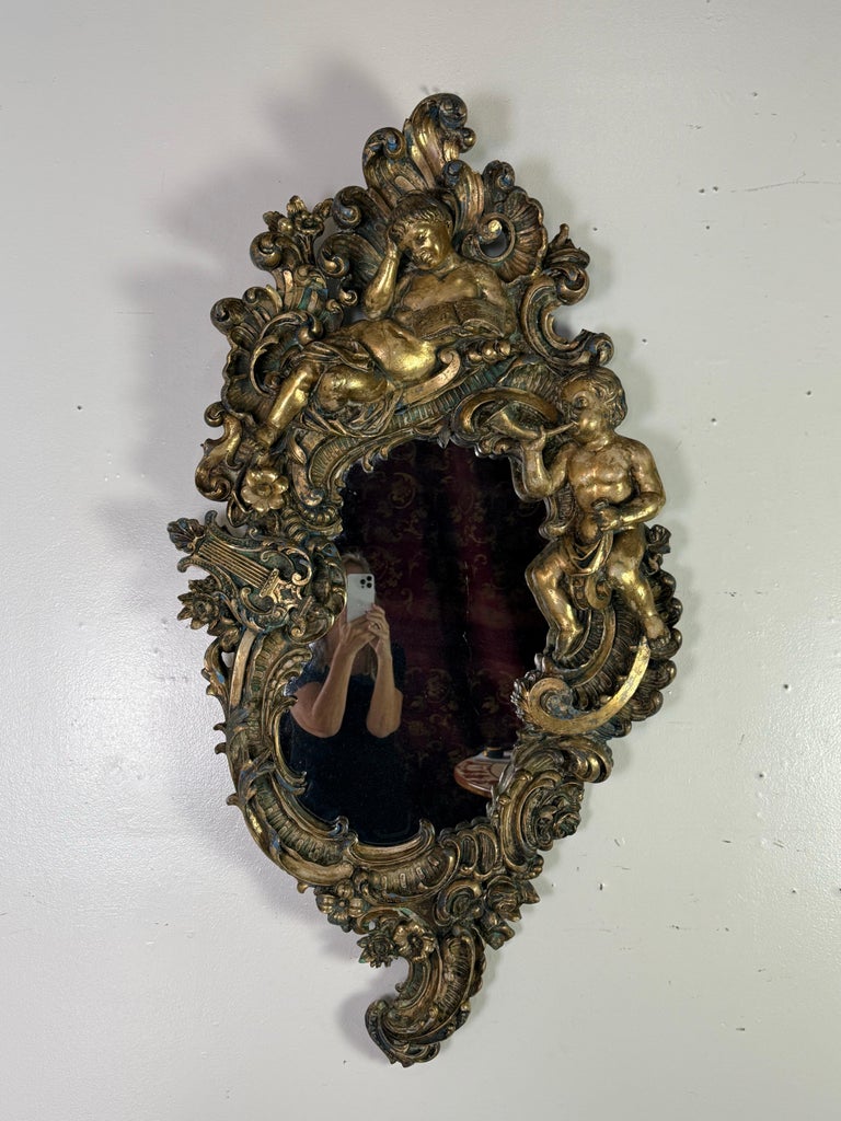19th Century Italian Rococo Giltwood Figural Mirror