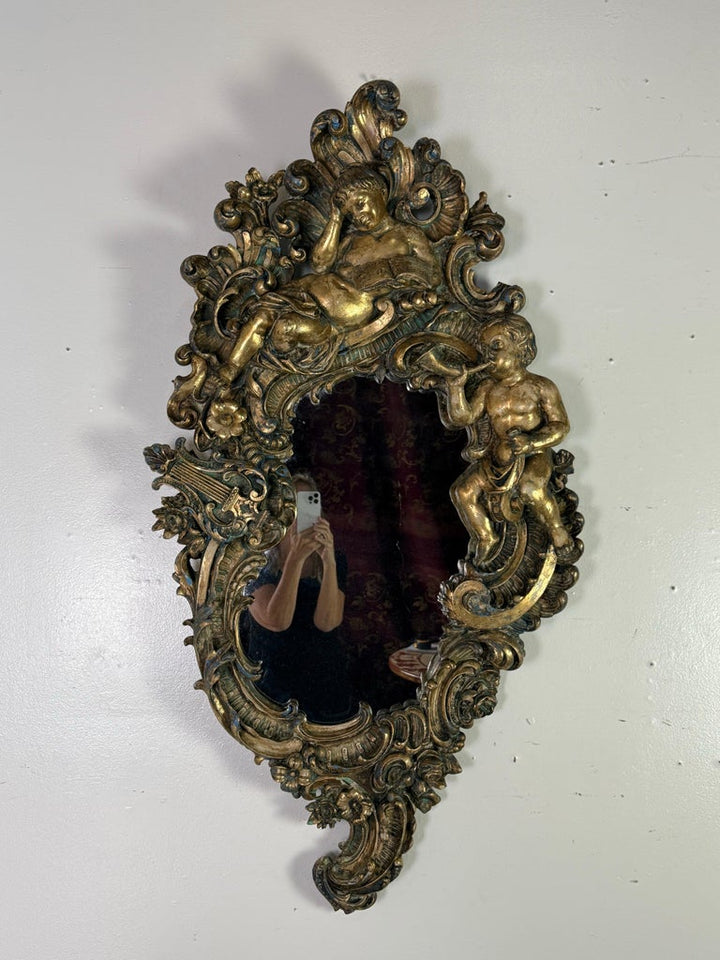 19th Century Italian Rococo Giltwood Figural Mirror
