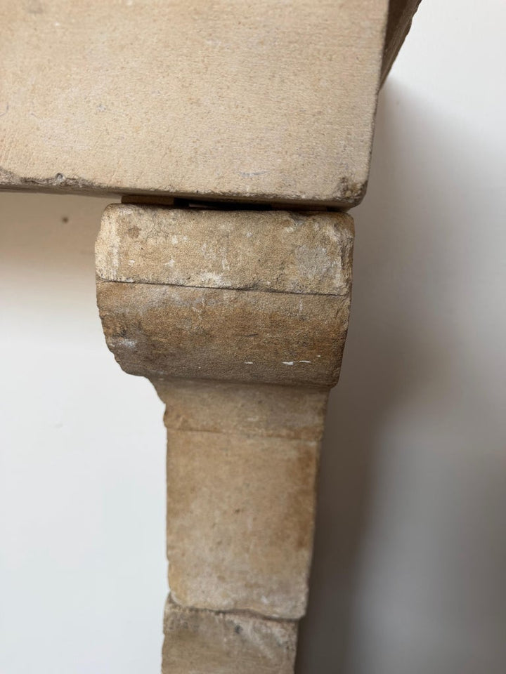 Petite 18th Century French Limestone Fireplace Mantel With Scrolled Corbels
