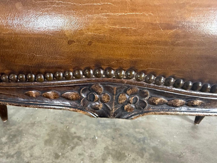 French Louis XV Style Carved Bench with Distressed Leather Upholstery
