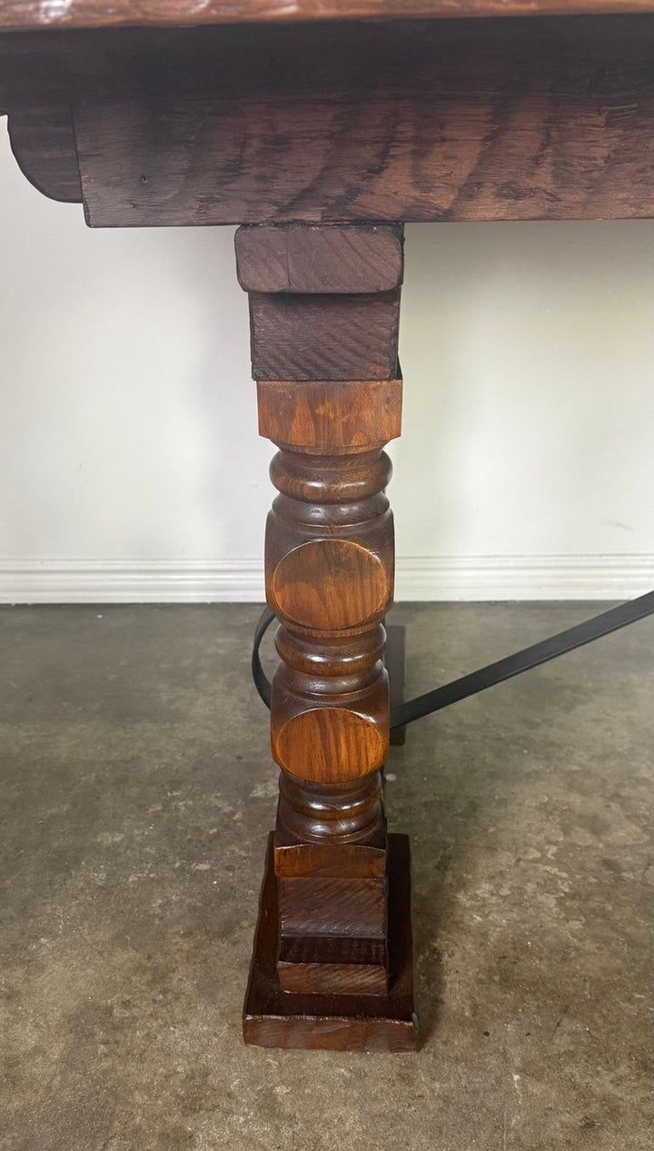 Monumental Spanish Revival Style Walnut Trestle Dining Table with Hand-Hewn Top