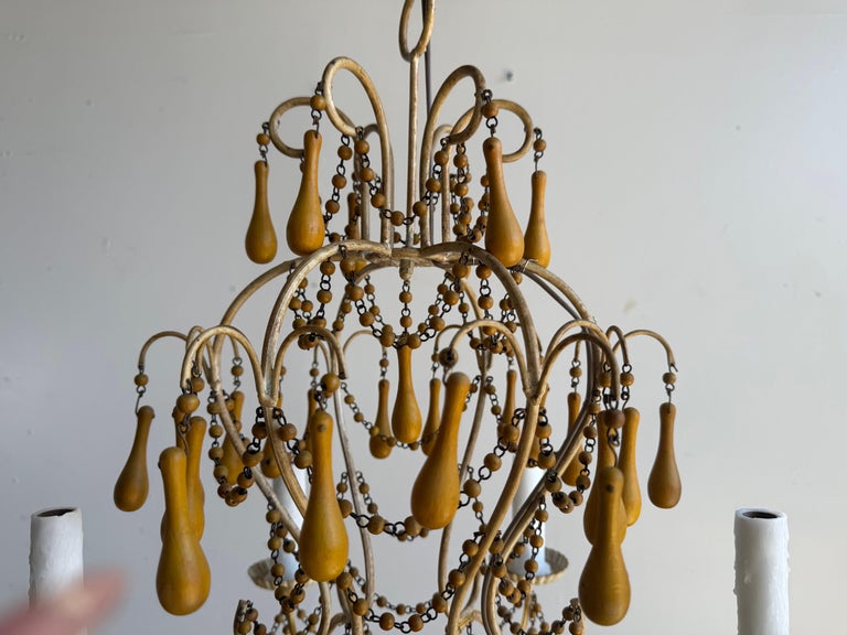 Pair of Italian Gilt Iron and Wood Beaded Chandeliers, Mid-20th Century