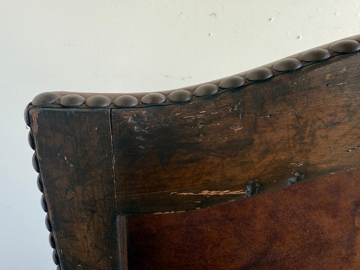 Set of Eight Spanish Revival Leather and Carved Walnut Dining Chairs