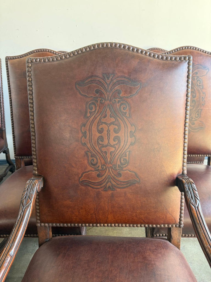 Set of Eight Spanish Revival Leather and Carved Walnut Dining Chairs