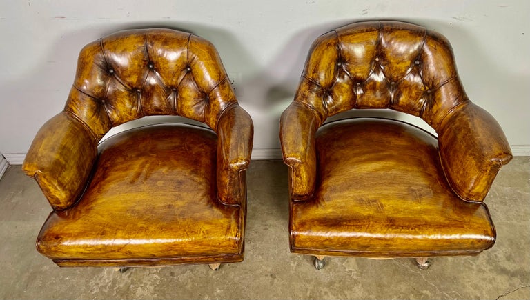 Pair of Mid-Century Leather Tufted Armchairs on Swivels