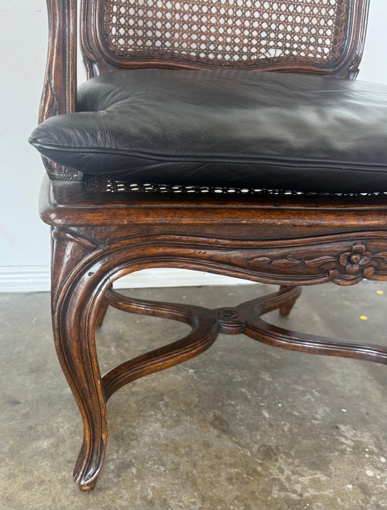 Eight French Provincial-style dining chairs