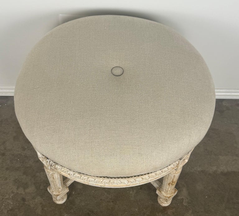French Neoclassical upholstered ottoman, early 20th century.