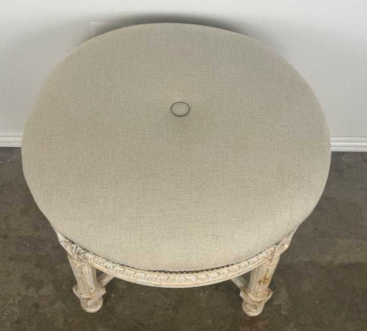 French Neoclassical upholstered ottoman, early 20th century.