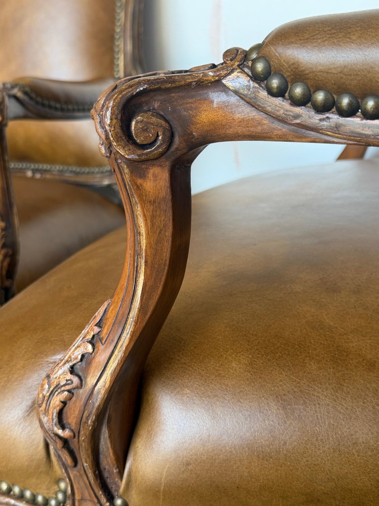 Pair of VIntage French Louis XV Cognac Leather Fauteuils