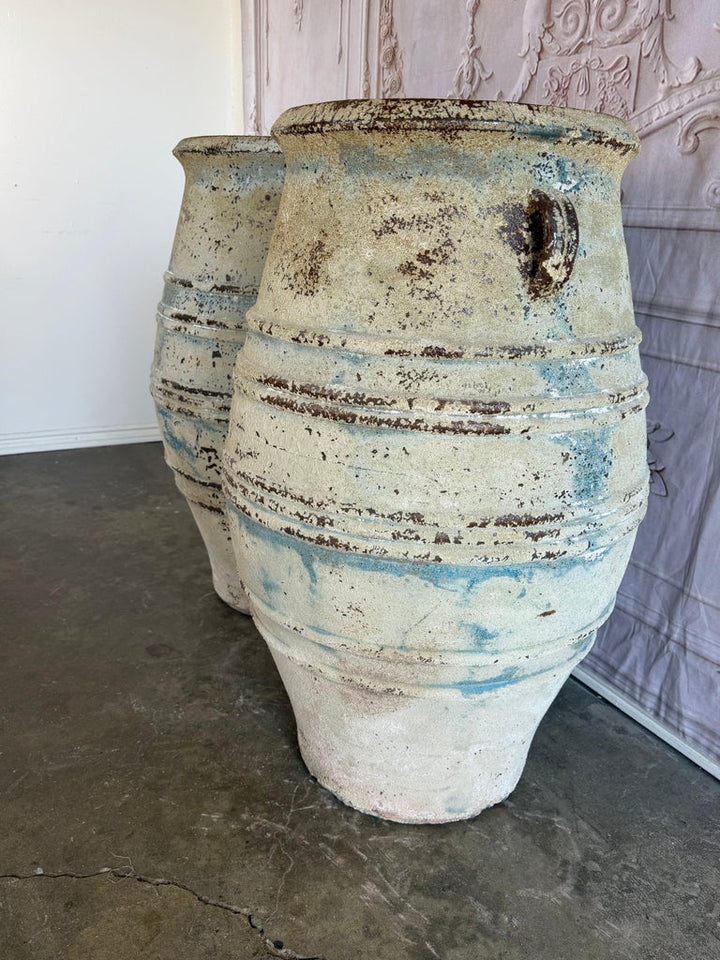 Pair of Large Distressed Mediterranean Style Terracotta Olive Jars with Handles