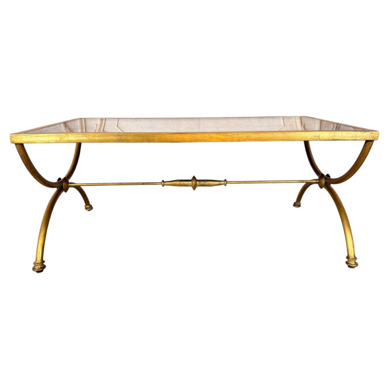 Curule Gilt Iron Coffee Table with Antiqued Mirror Top by Miamar Home