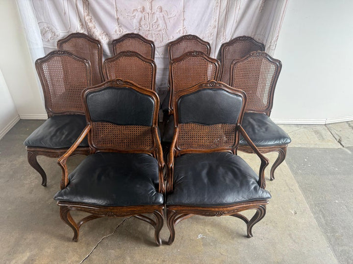 Eight French Provincial-style dining chairs