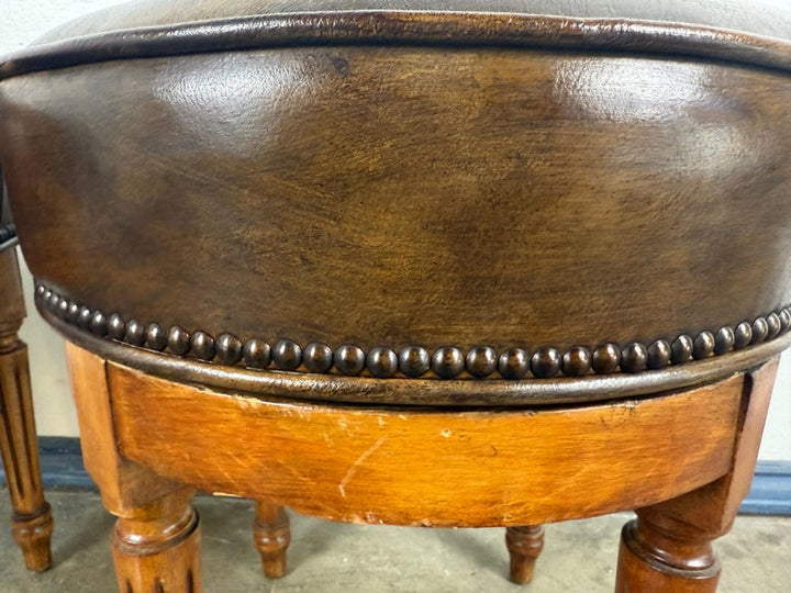Pair of Louis XVI–Style Swivel Stools in Patinated Leather, Mid-20th Century
