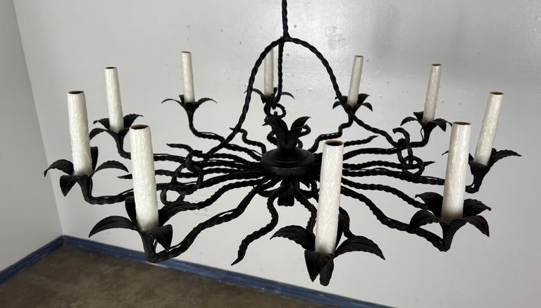 Spanish Revival Wrought Iron Twelve-Light Chandelier, circa 1930