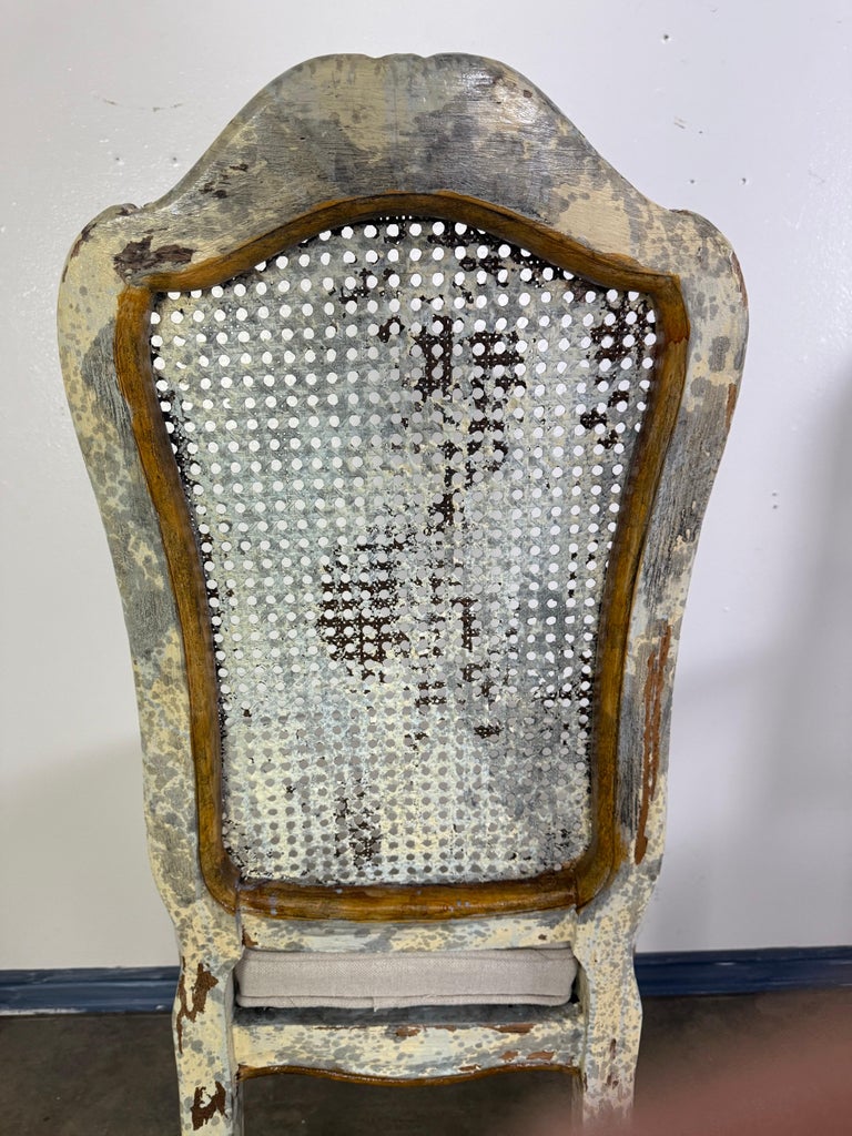 Set of 8 Distressed French Louis XV Style Dining Chairs with Cane Backs