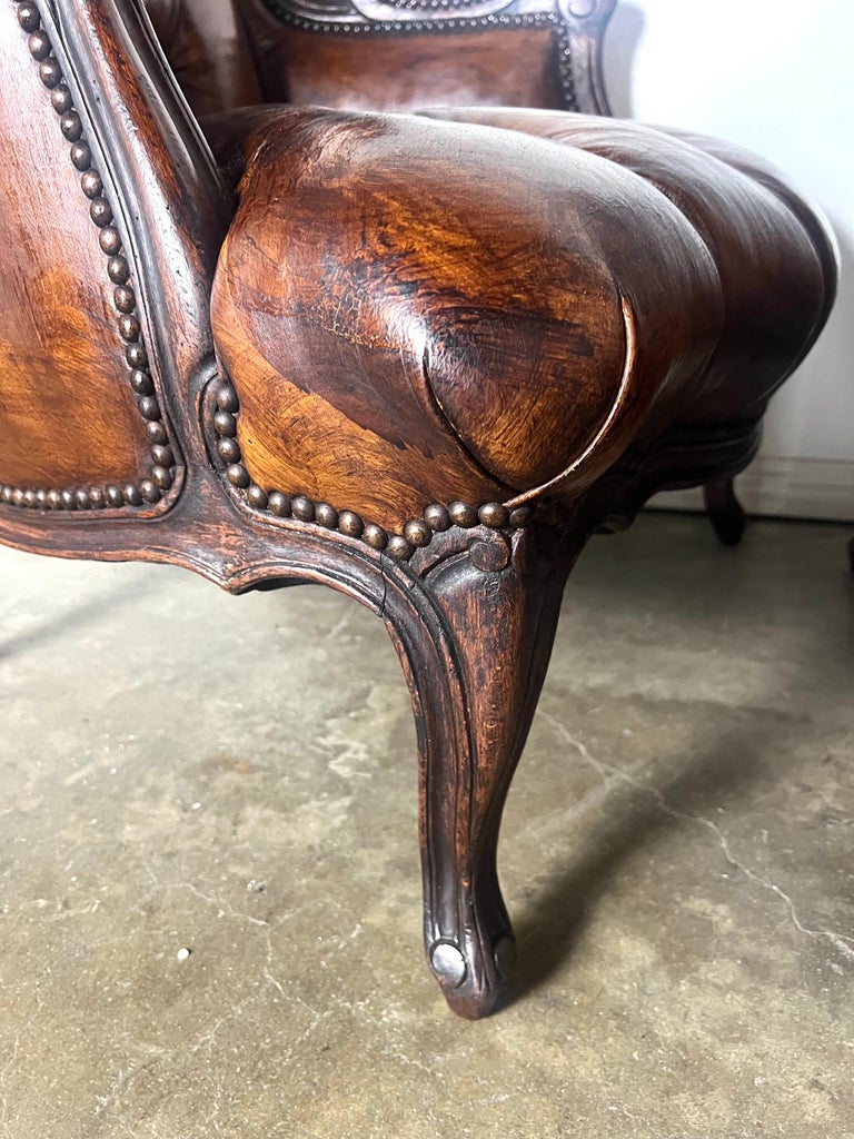 Pair of French Leather Tufted Wingback Chairs C. 1930