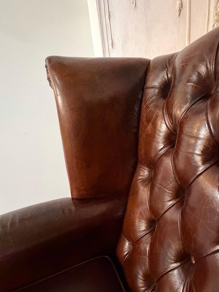 Pair of Vintage English Tufted Leather Wingback Armchairs
