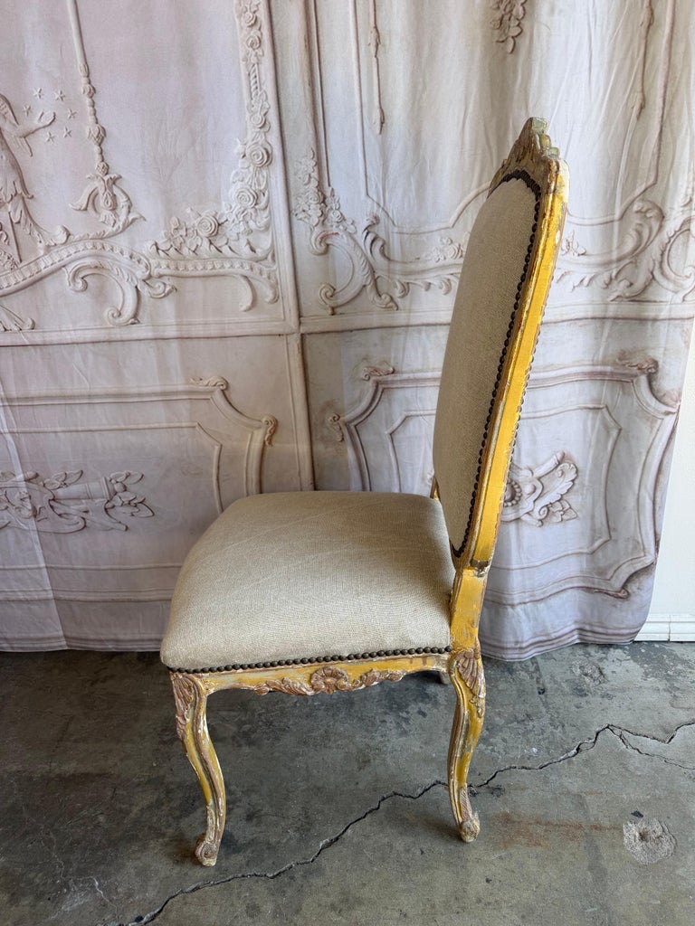 Set of 14 French Louis XV Style Distressed Dining Chairs with Linen Upholstery