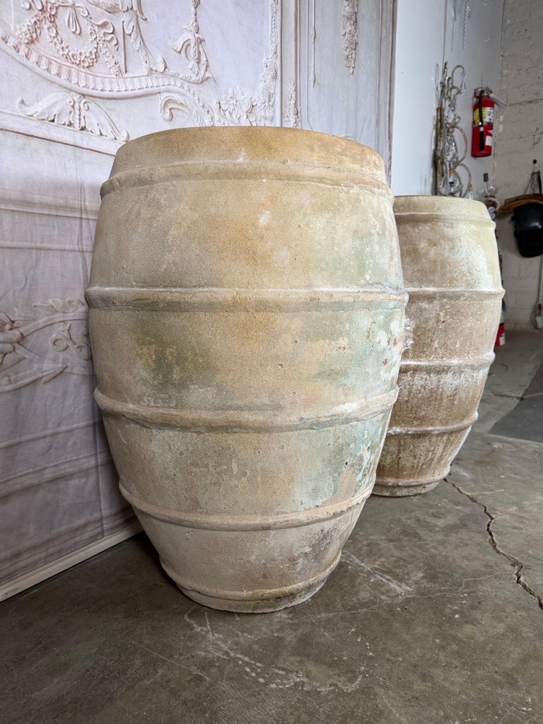 Pair of Antique Mediterranean Terracotta Storage Jars with Weathered Patina