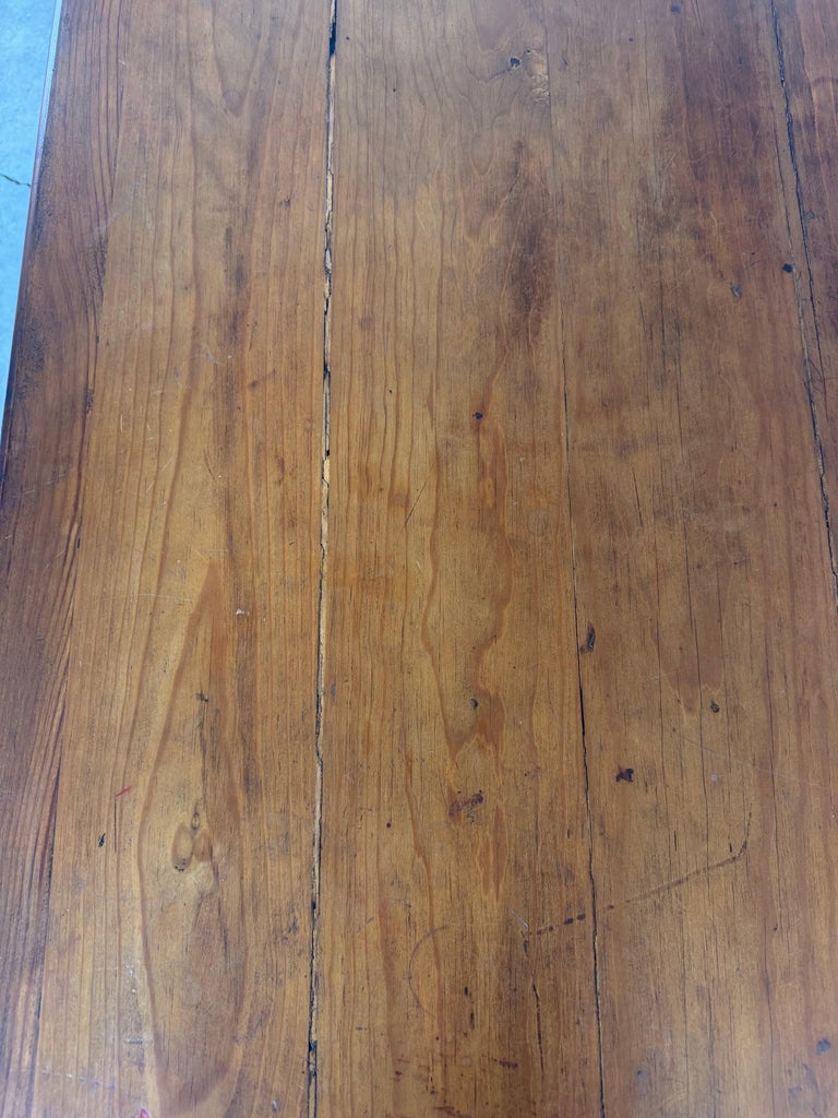 Spanish Colonial Revival Walnut Dining Table with Hand-Carved Scrollo
