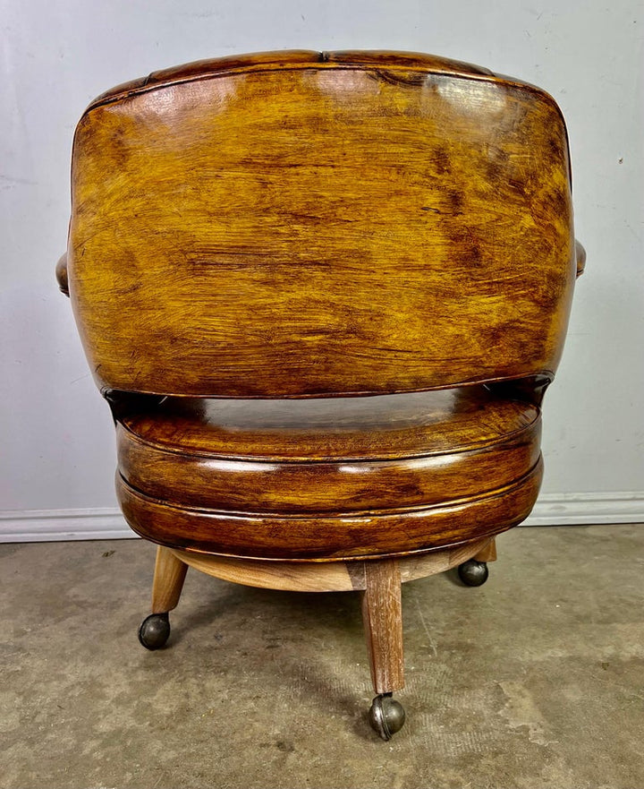 Pair of Mid-Century Leather Tufted Armchairs on Swivels